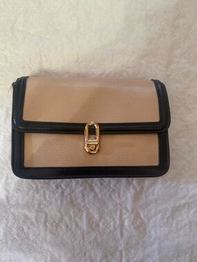 Elegant Beige and Black Crossbody Bag with Gold Hardware